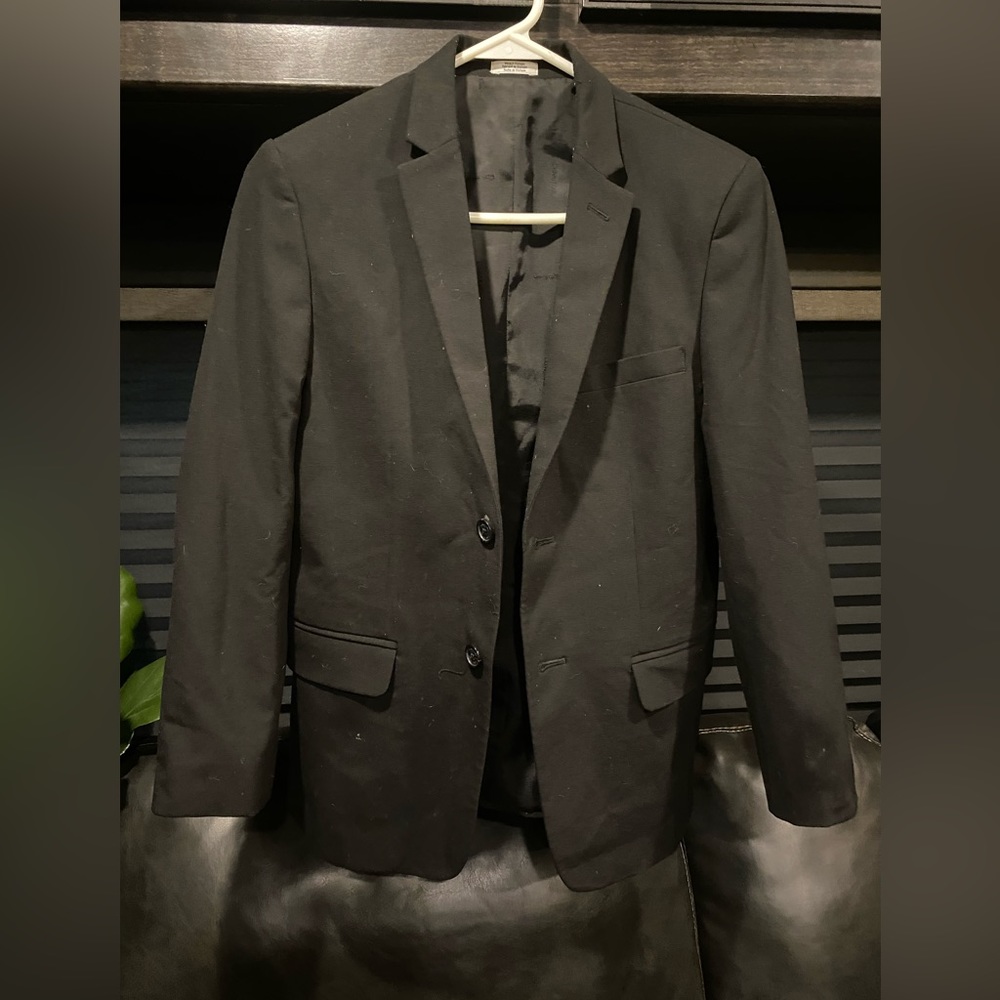 Calvin Klein blazer size 14 if fits a small size